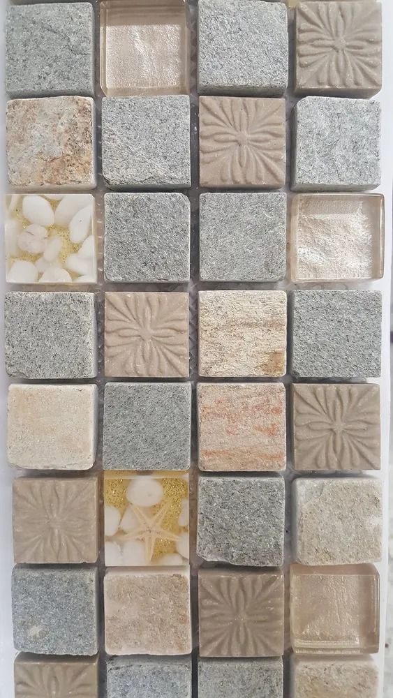 Beige, gray, and tan mosaic tile samples in a grid pattern.