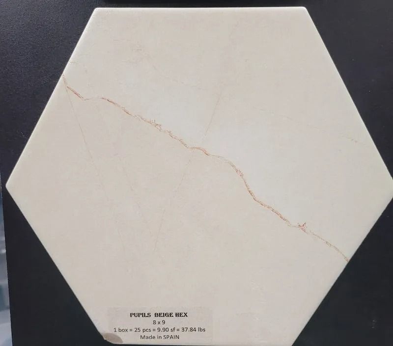 White hexagonal sample tile with a faint diagonal crack on a dark background