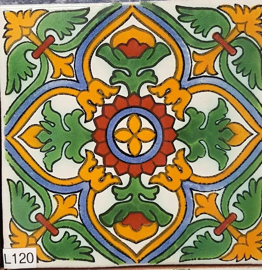 Colorful geometric floral tile with orange, green, blue, and white symmetrical patterns