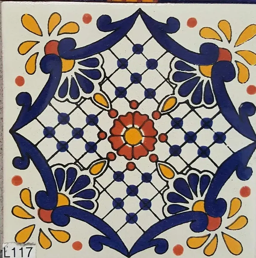 Blue, orange, and white floral tile pattern with a central flower and geometric border