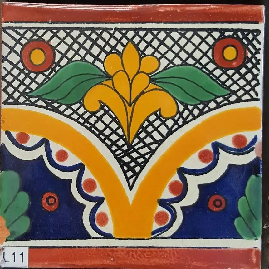 Colorful floral tile with yellow, green, blue, and red geometric patterns