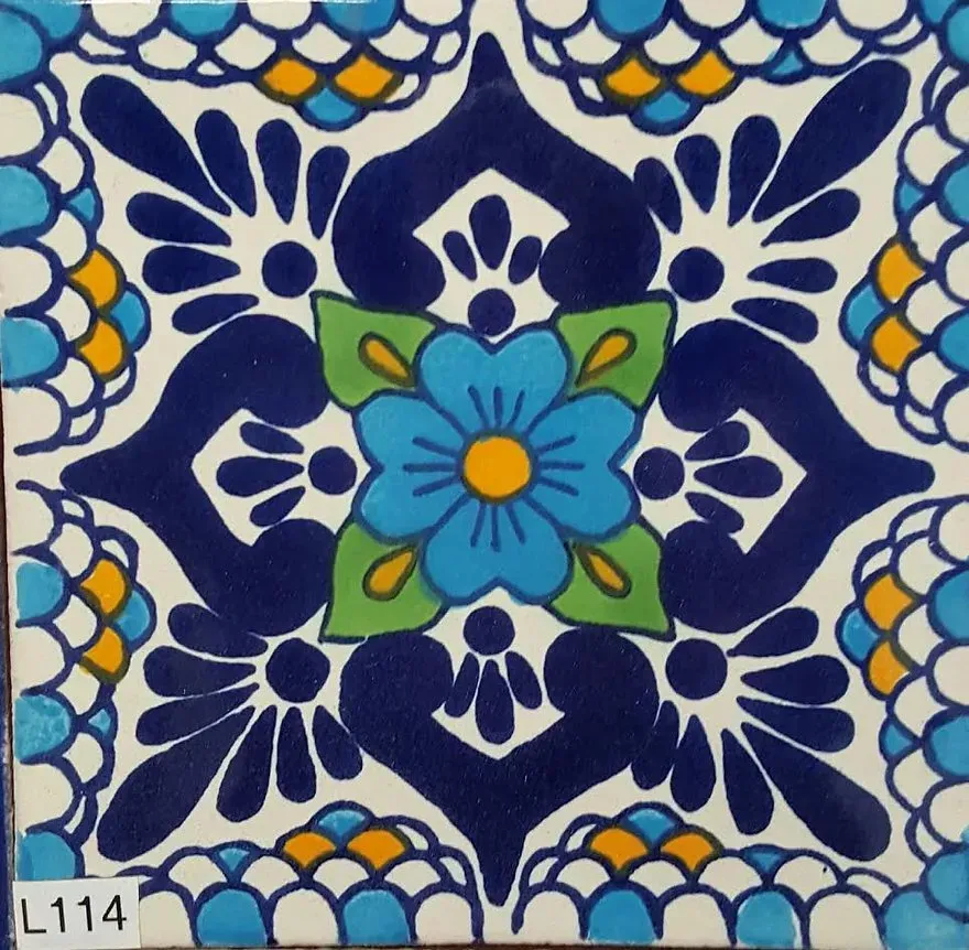 Blue and green floral tile pattern with a central turquoise flower and scalloped border