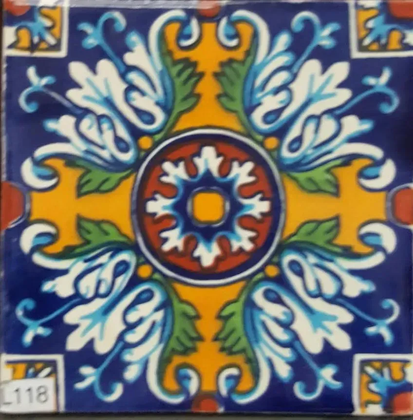 Colorful floral tile pattern with blue, white, orange, and yellow geometric design