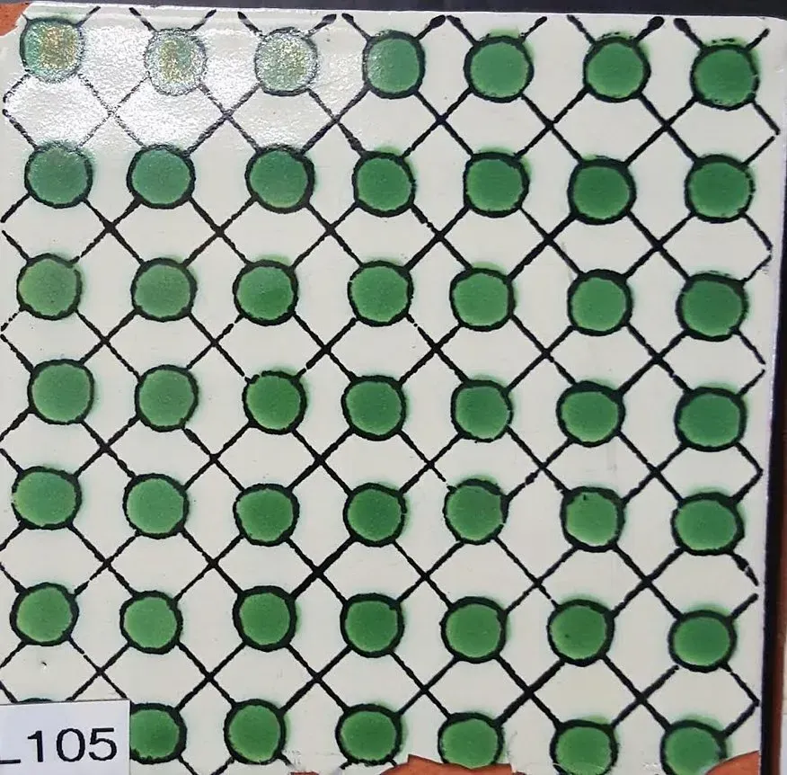 Green circular tokens arranged in a grid on a white lattice board, with a small “105” label at bottom left
