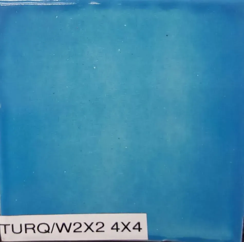 Blue rectangular panel with a small white label reading “TURQ/W2X2 4X4” at the bottom left