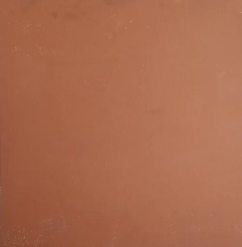Plain brown textured surface with a few faint specks