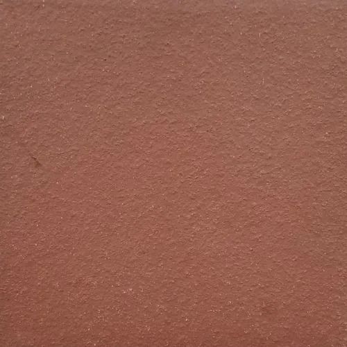 Close-up of a plain brown textured surface
