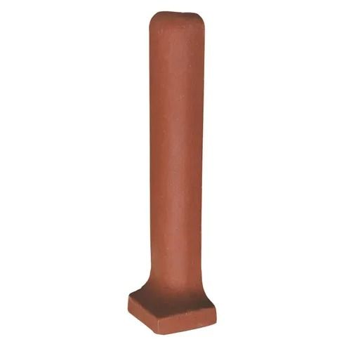 A brown brick column with a square base on a white background