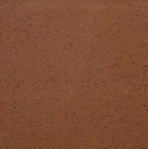 Close-up of a brown, speckled textured surface