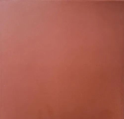 Solid reddish-brown square surface with a subtle gradient and faint edge shading