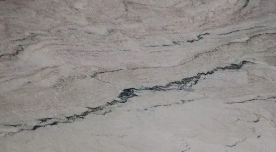 Light gray marble surface with dark veining across the center