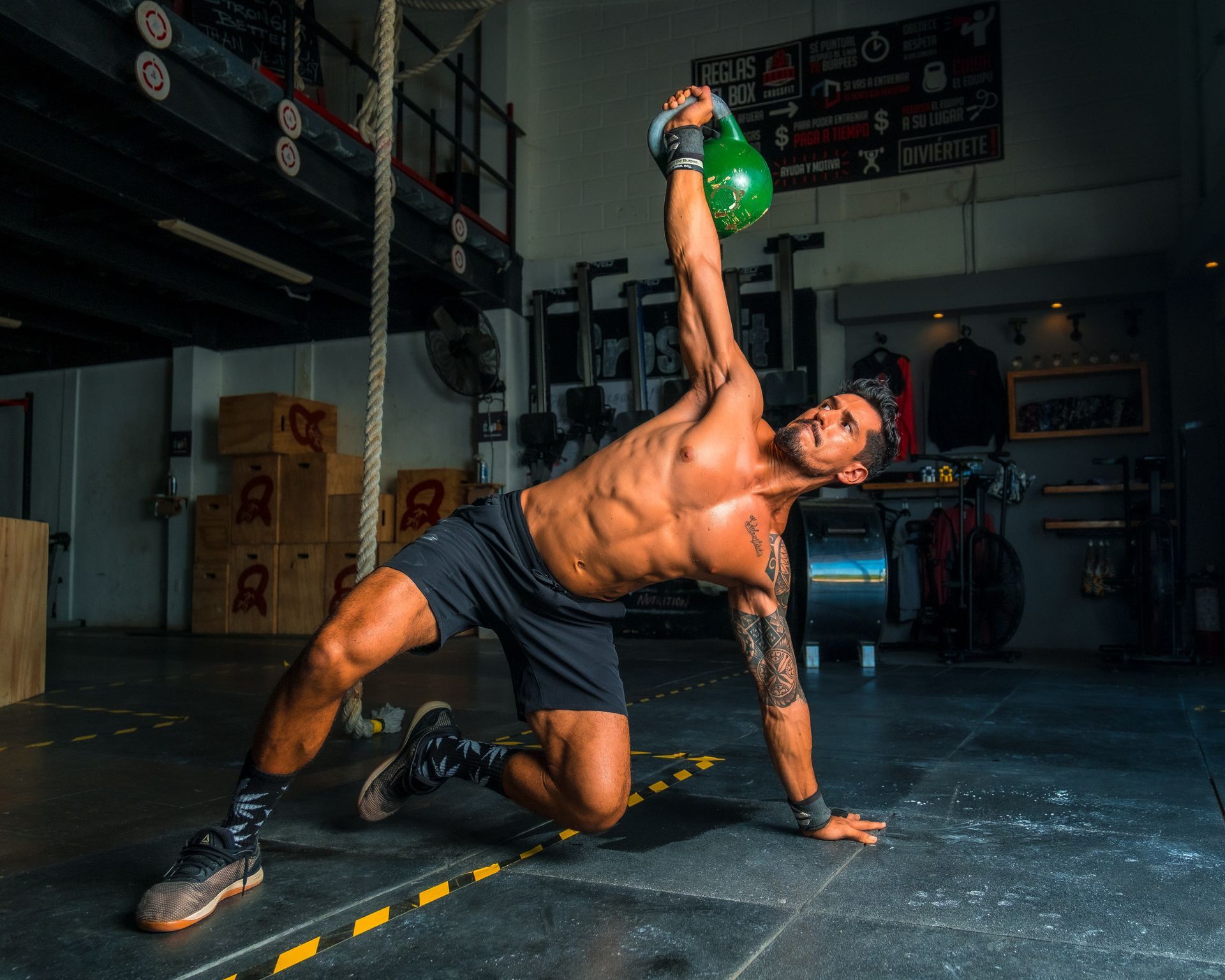 A man working out with a kettle bell