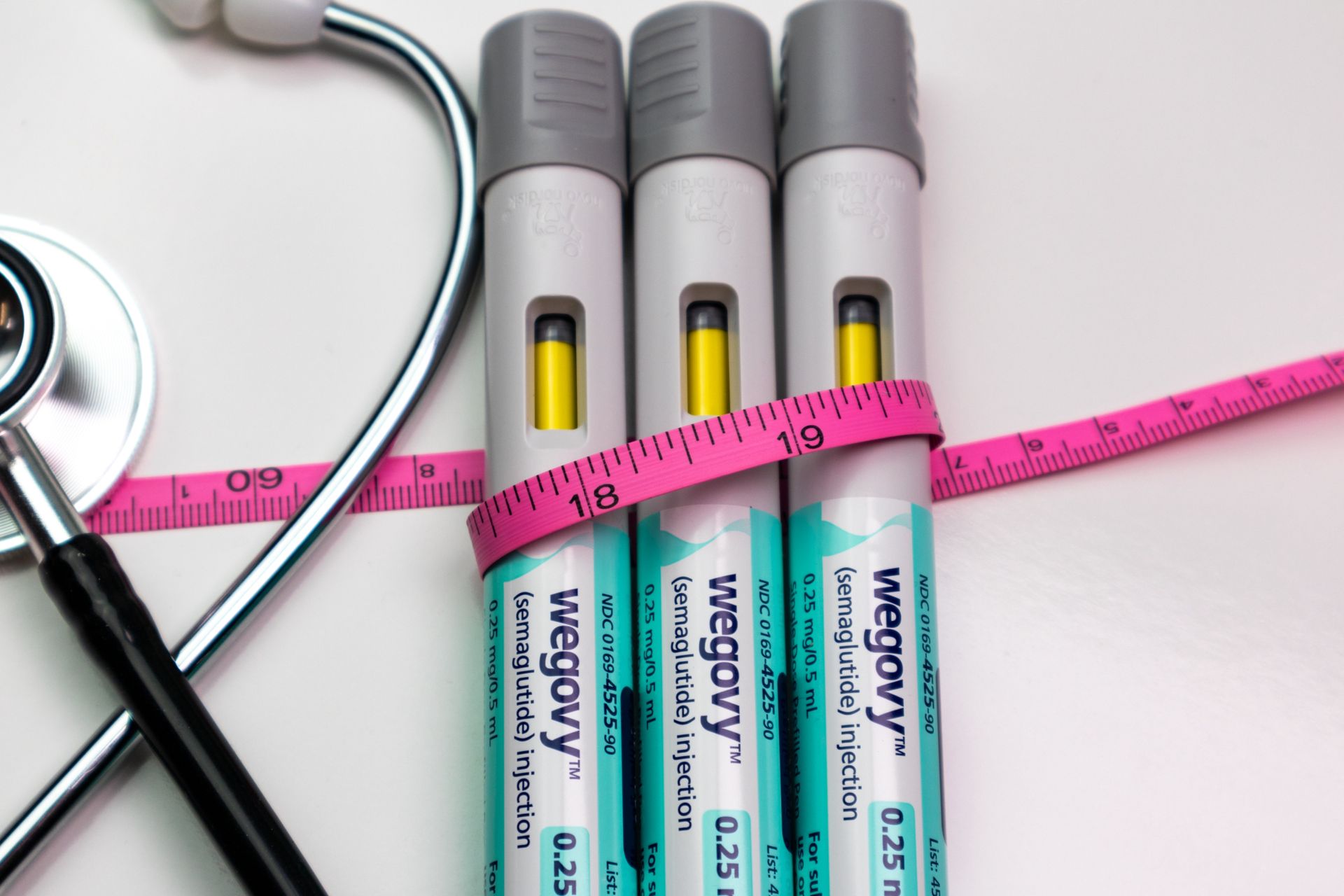 Three Wegovy injection pens