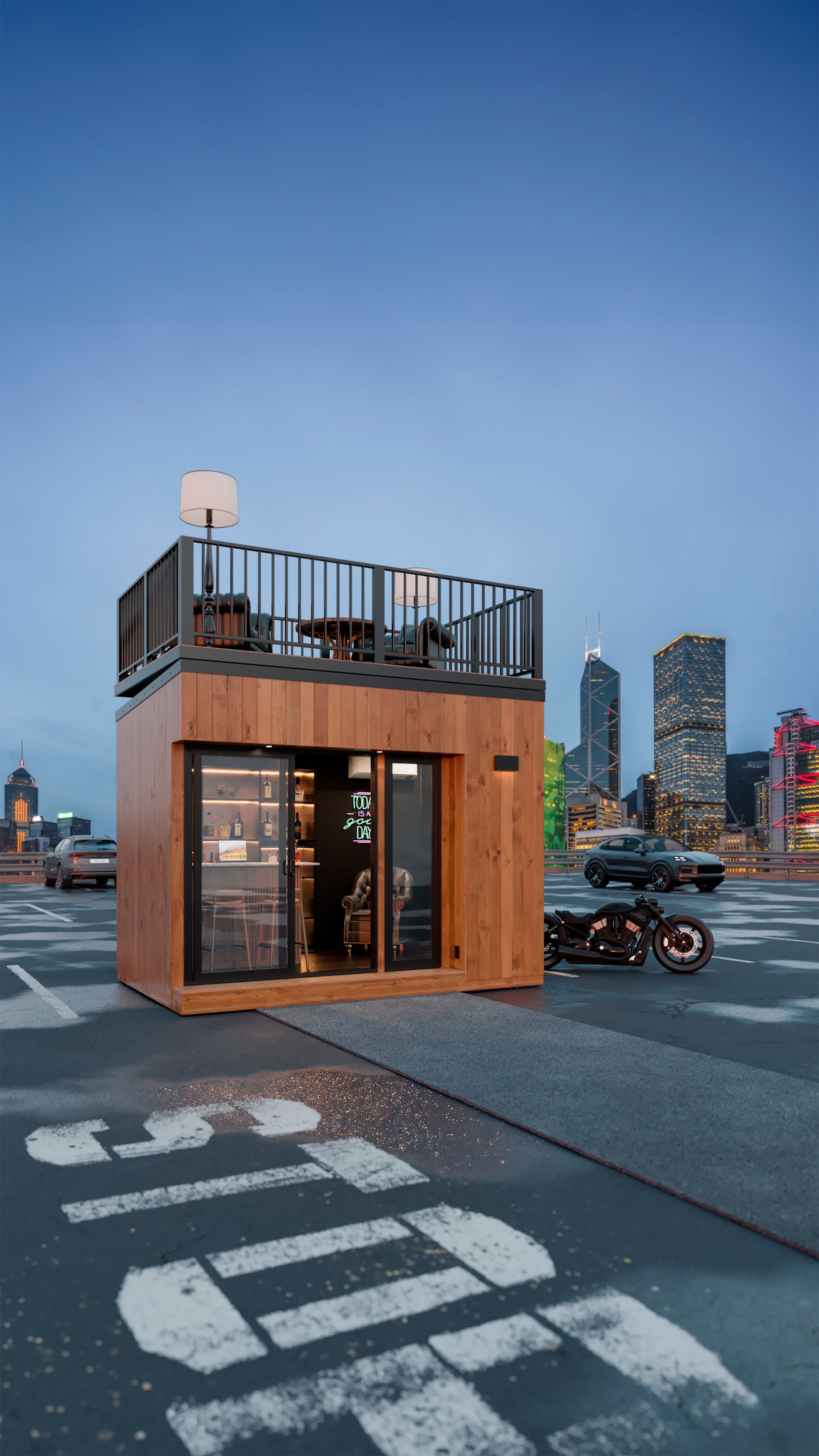 A small wooden building with a balcony on top of it in a parking lot.