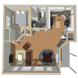A floor plan of a house with a bedroom, living room, and kitchen.