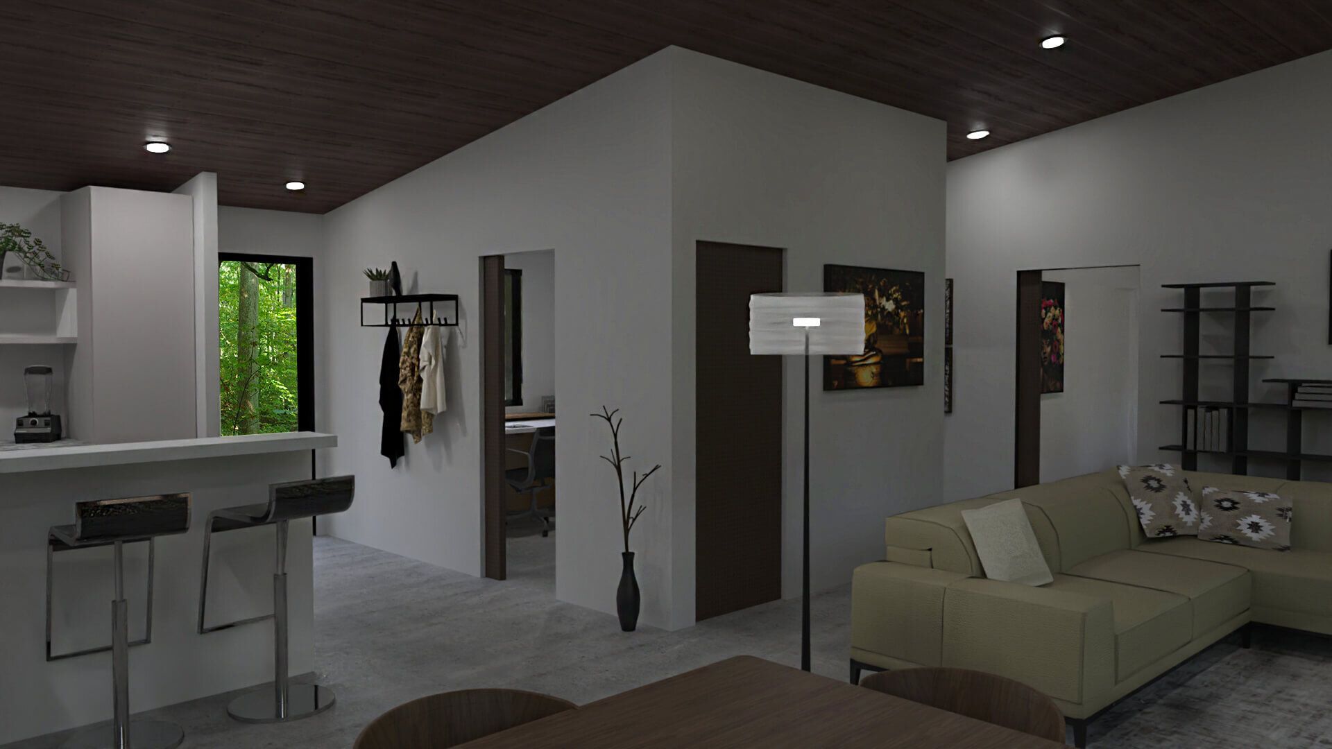 A living room with a couch, table, and bar.