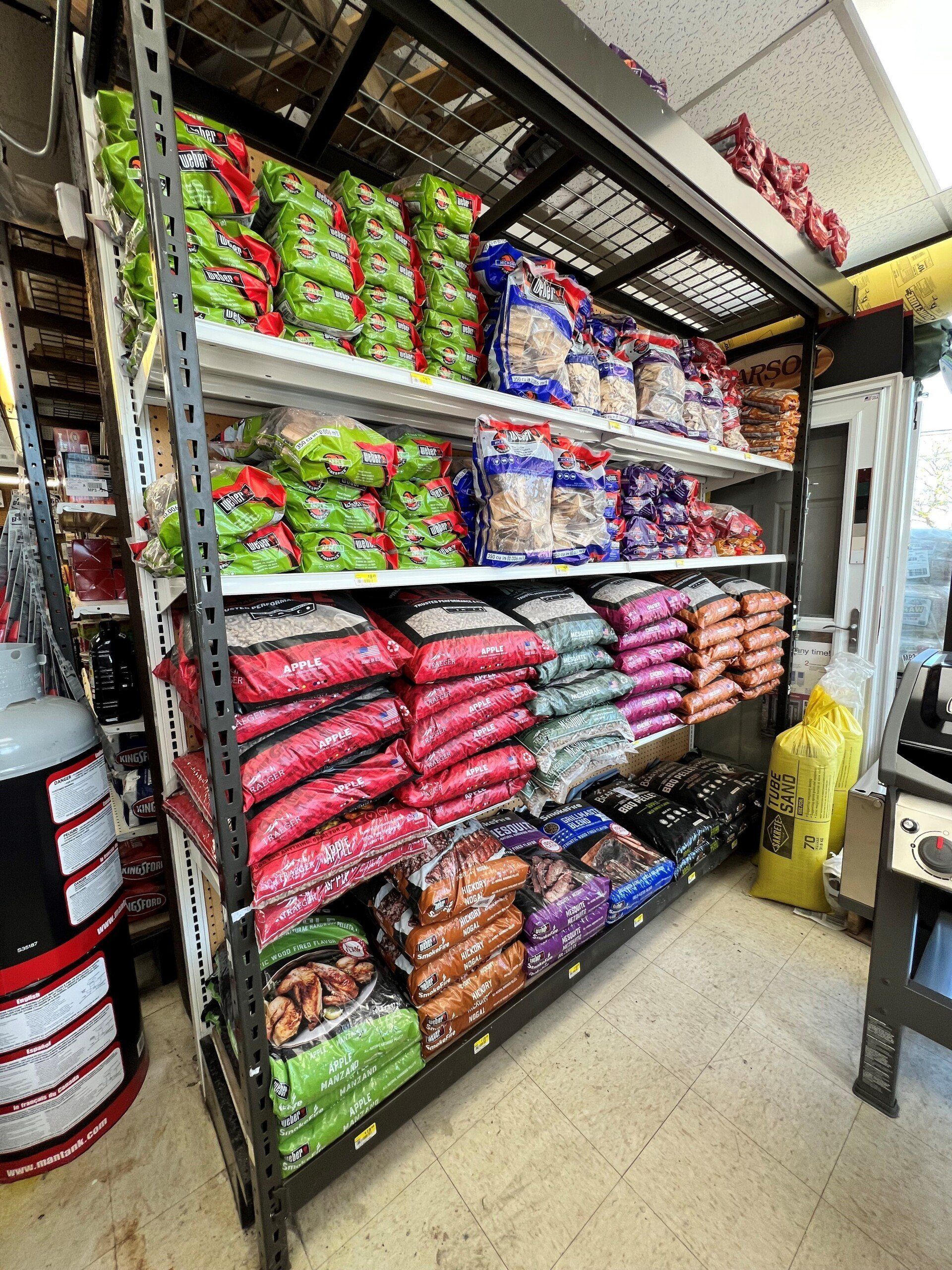 A store filled with lots of bags of food on shelves.