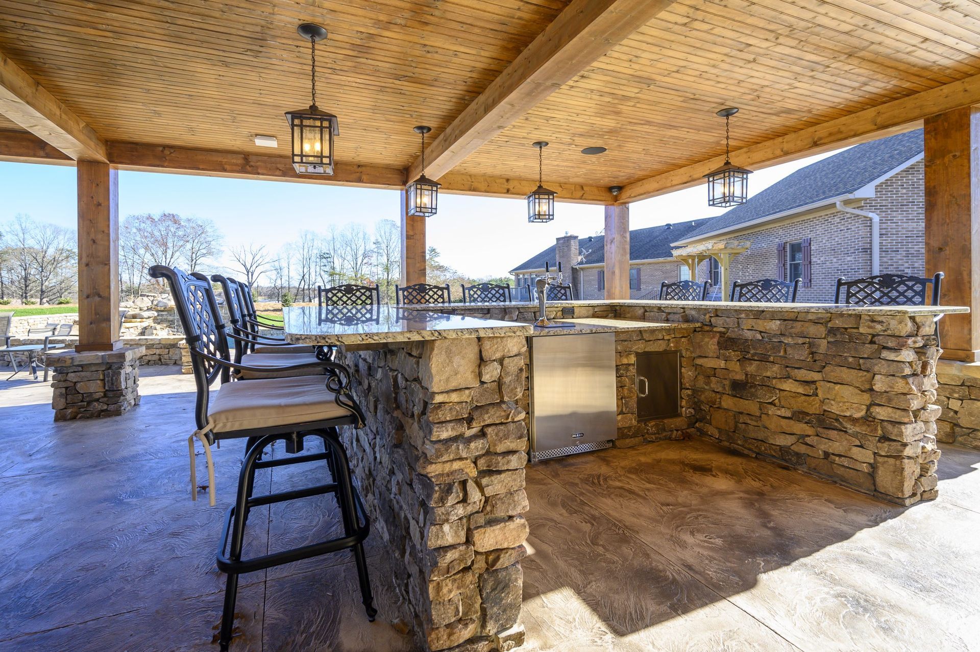 Furnish patio and outdoor kitchen