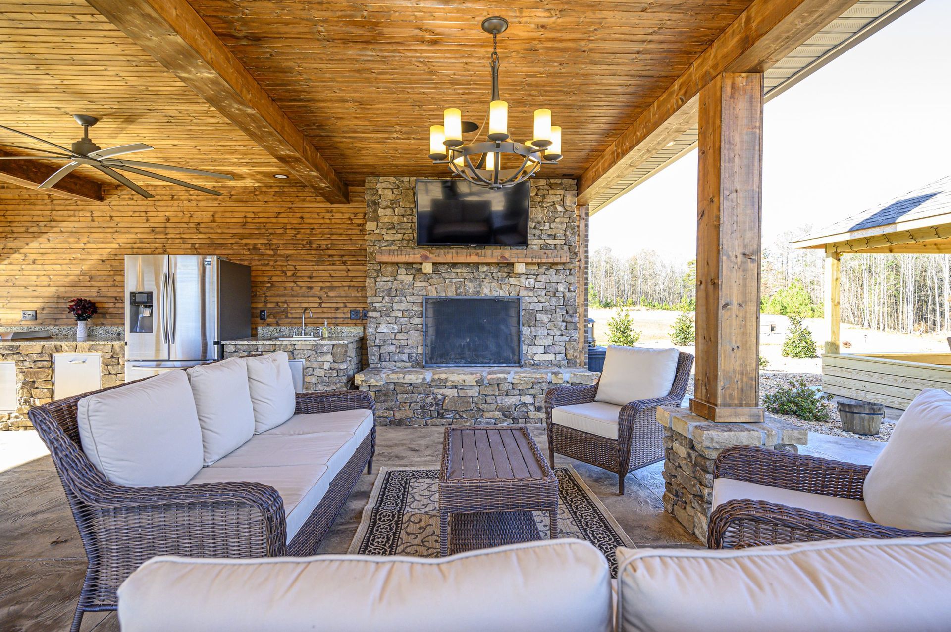 Furnish patio and outdoor kitchen