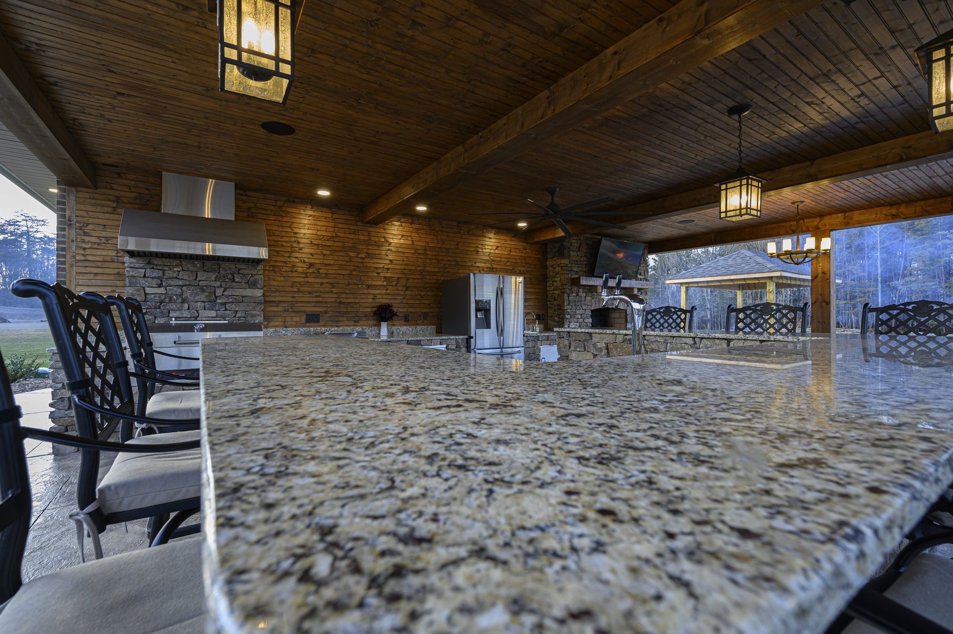 Furnish patio and outdoor kitchen