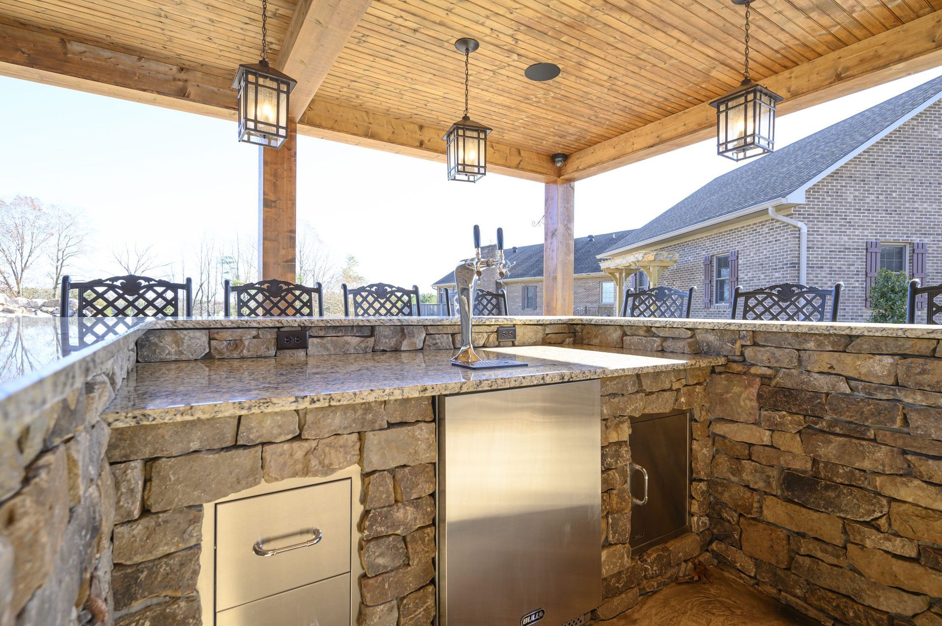 Furnish patio and outdoor kitchen