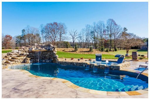 Luxury in-ground pool with waterfall