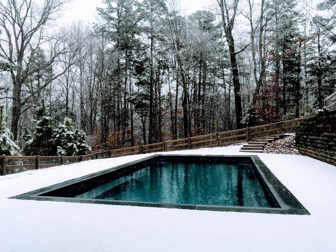 Tregoning Family pool and snowy lawn
