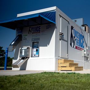 A white building with the word ice on it