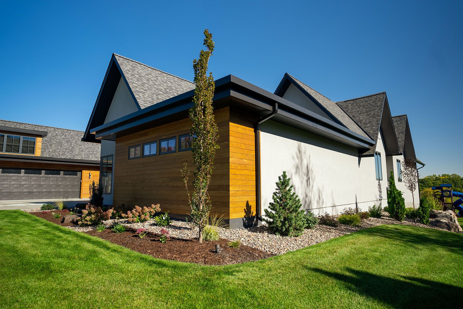 beautiful landscaping near the garage in Cress View Estates
