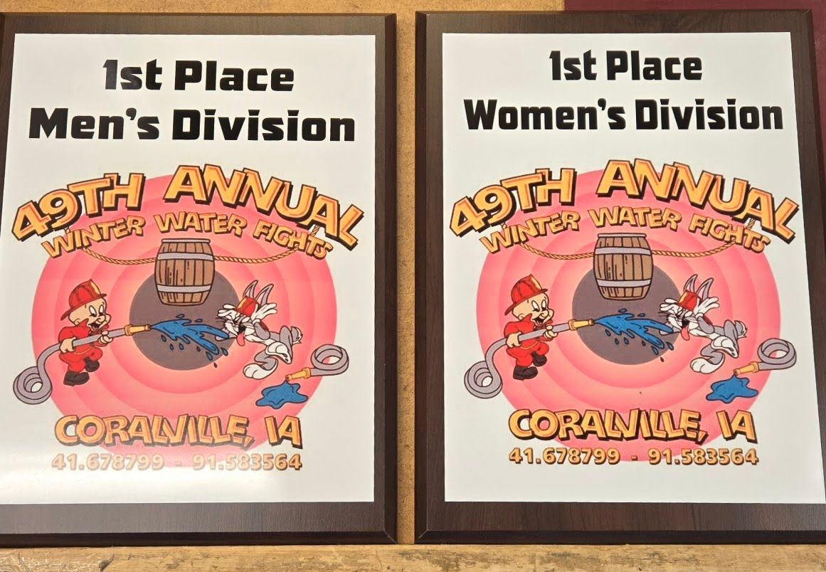 Two plaques for the 49th annual men 's division and women 's division