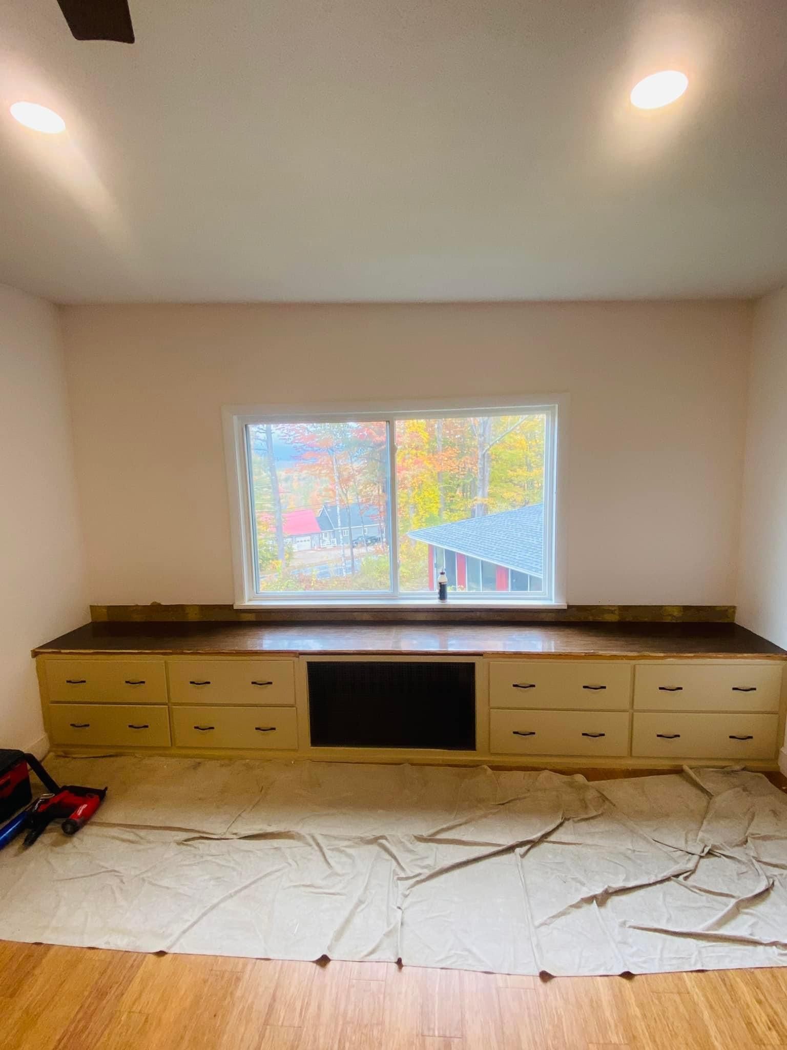 there is a large window in the middle of the room