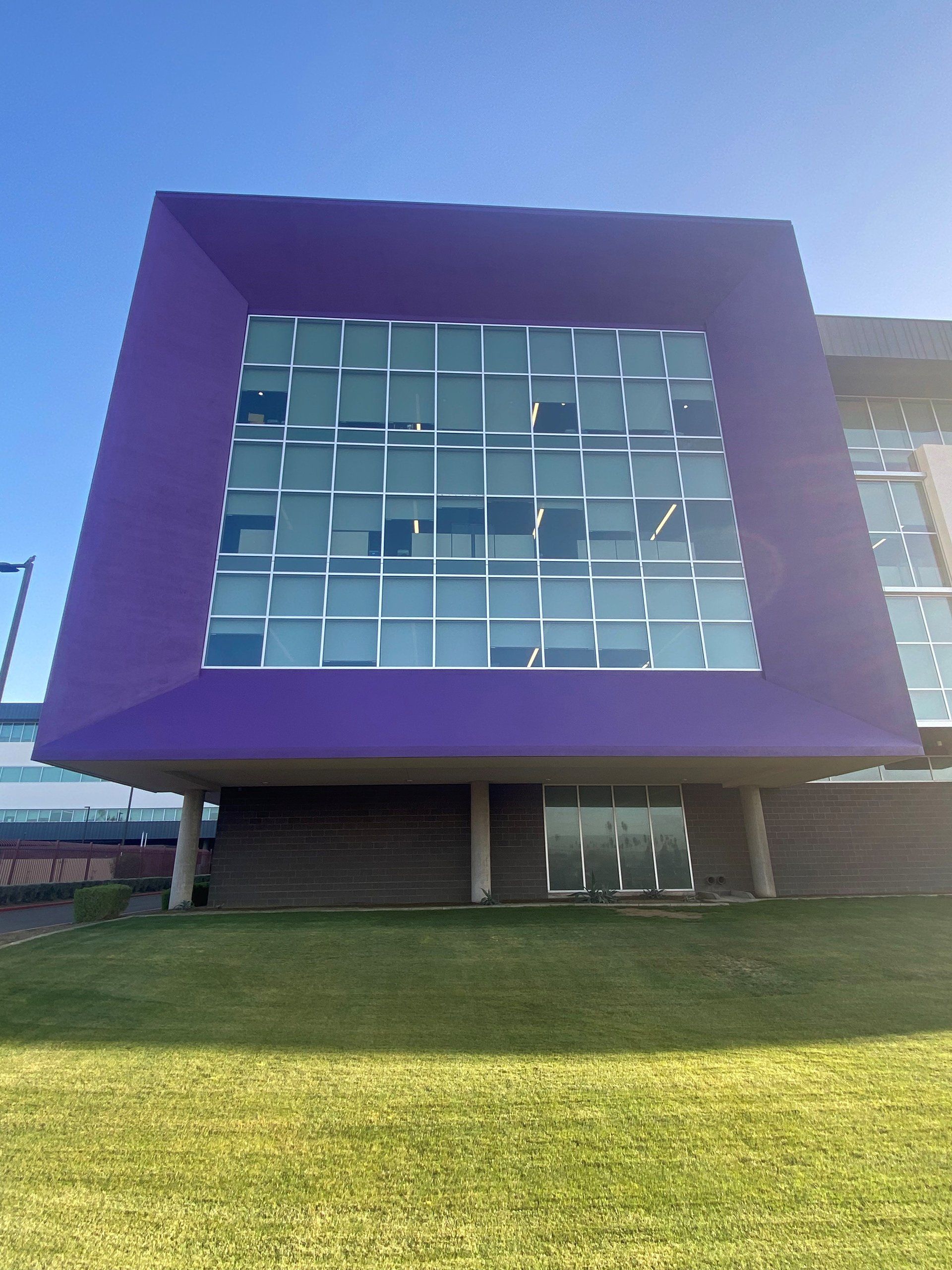 building with purple window up close