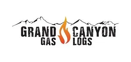 A logo for grand canyon gas logs with mountains in the background.