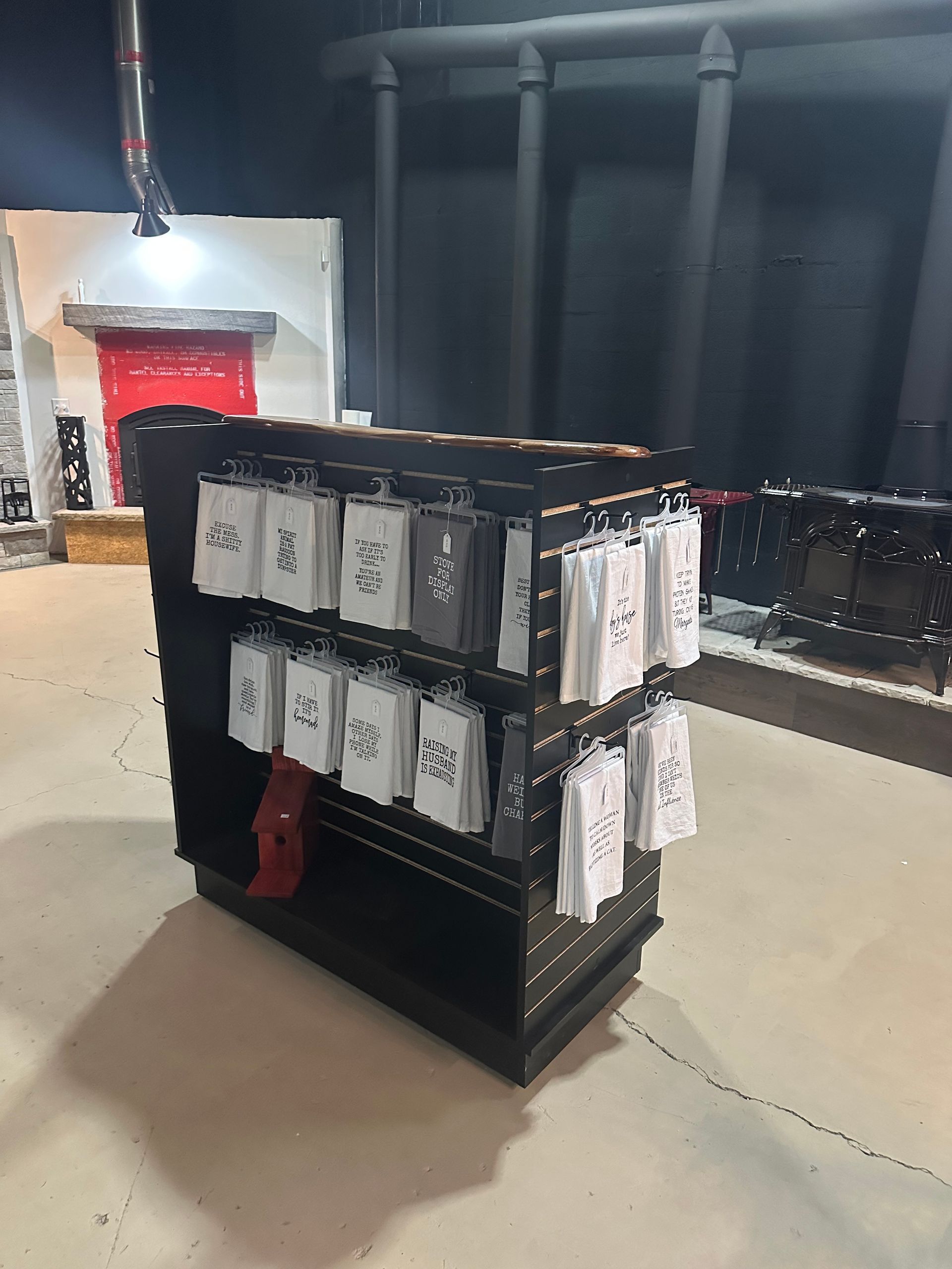 A shelf with socks hanging on it in a store.