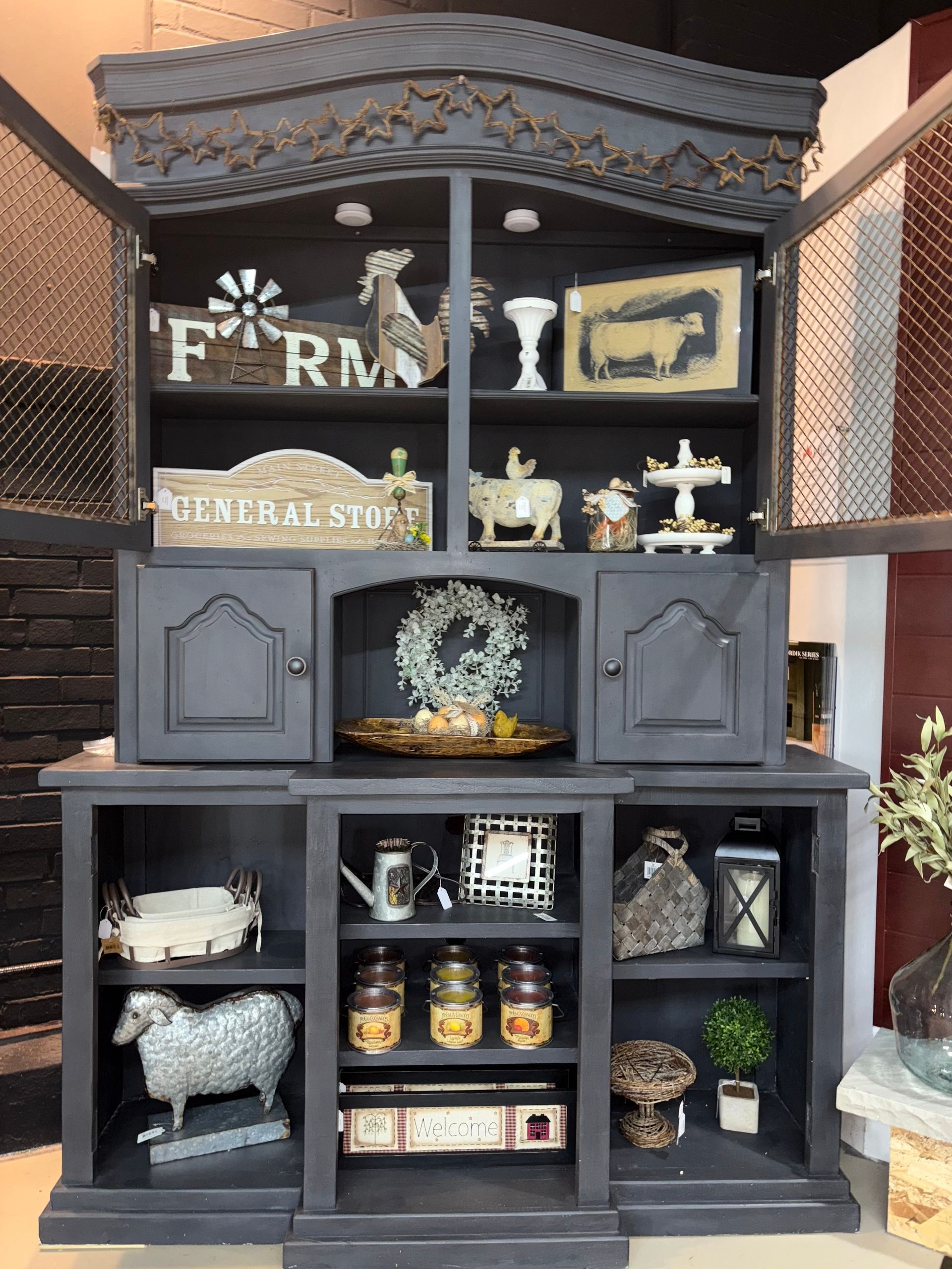 a black hutch with a sign that says farm on it
