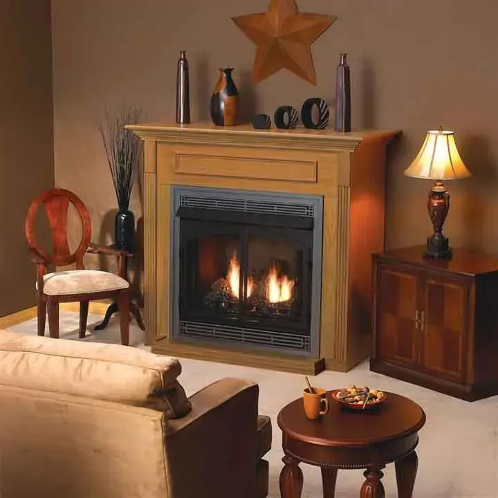 A living room with a fireplace and a lamp