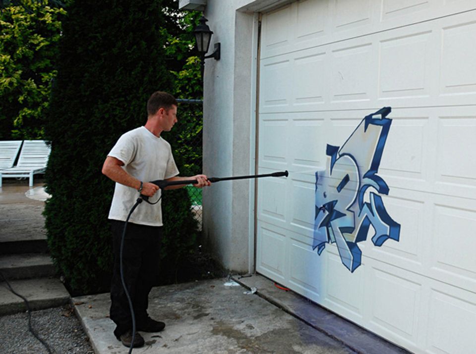 Man removing paint