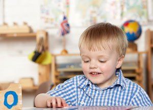 a blonde cute little boy