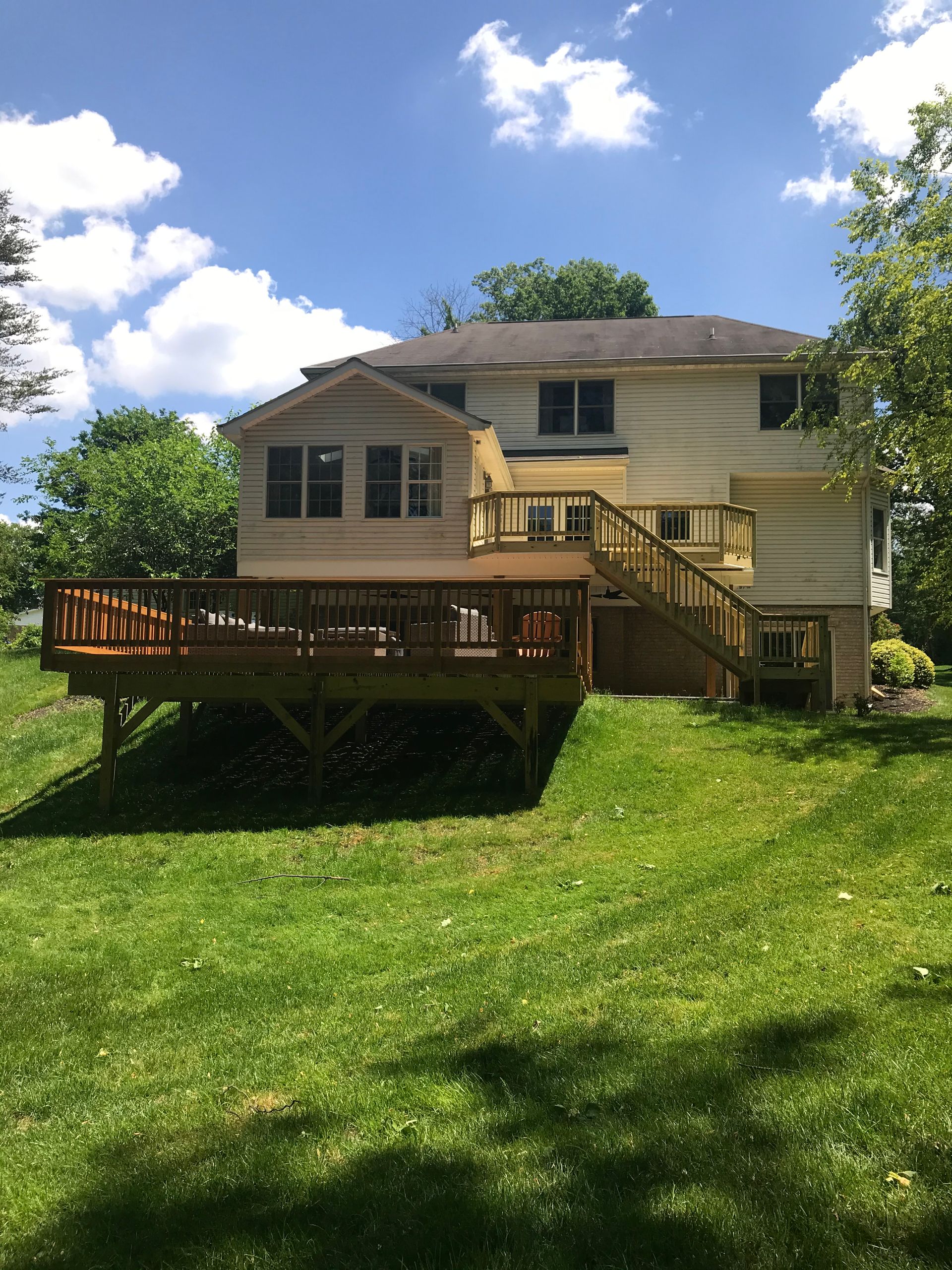 house, deck, and lawn