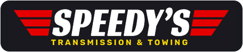 Speedy’s Transmission & Towing logo in red, white, and yellow on a black background
