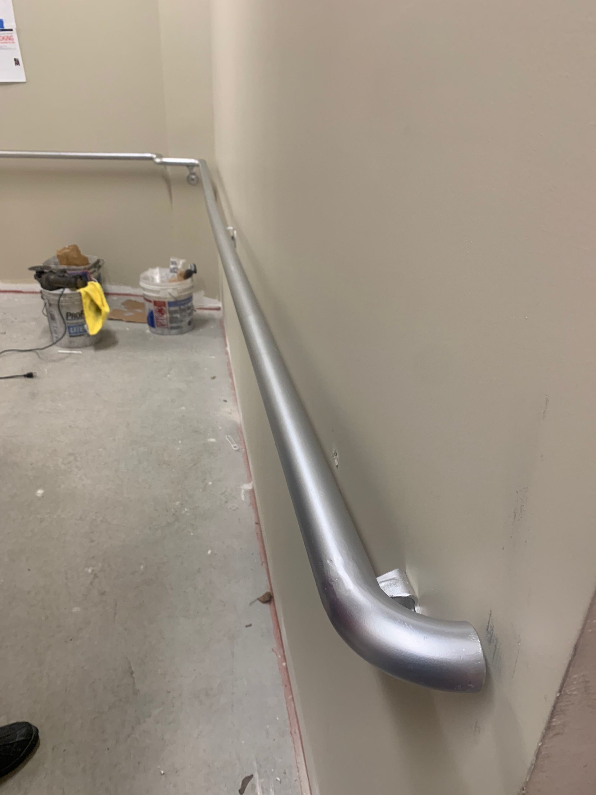Metal ADA accessibility handrail installation in New Jersey