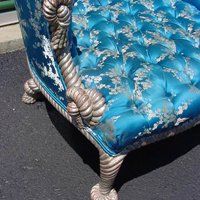 Closeup of antique upholstered chair
