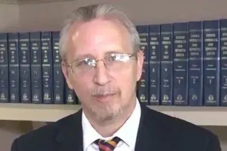 Photo of {{Team Member Name}}