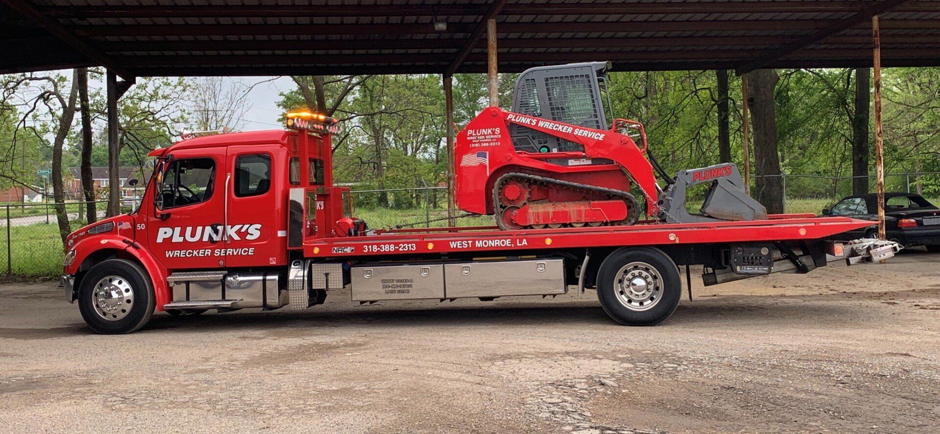 Unit #50 loaded with PWS skid steer