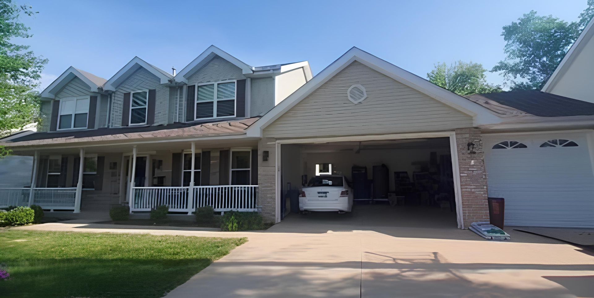 A car is parked in the garage of a large house - Before