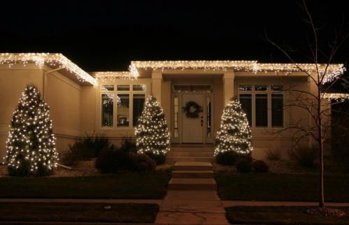 House decorated with Christmas lights at night