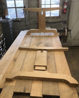 Construction of a large oak table is currently in progress
