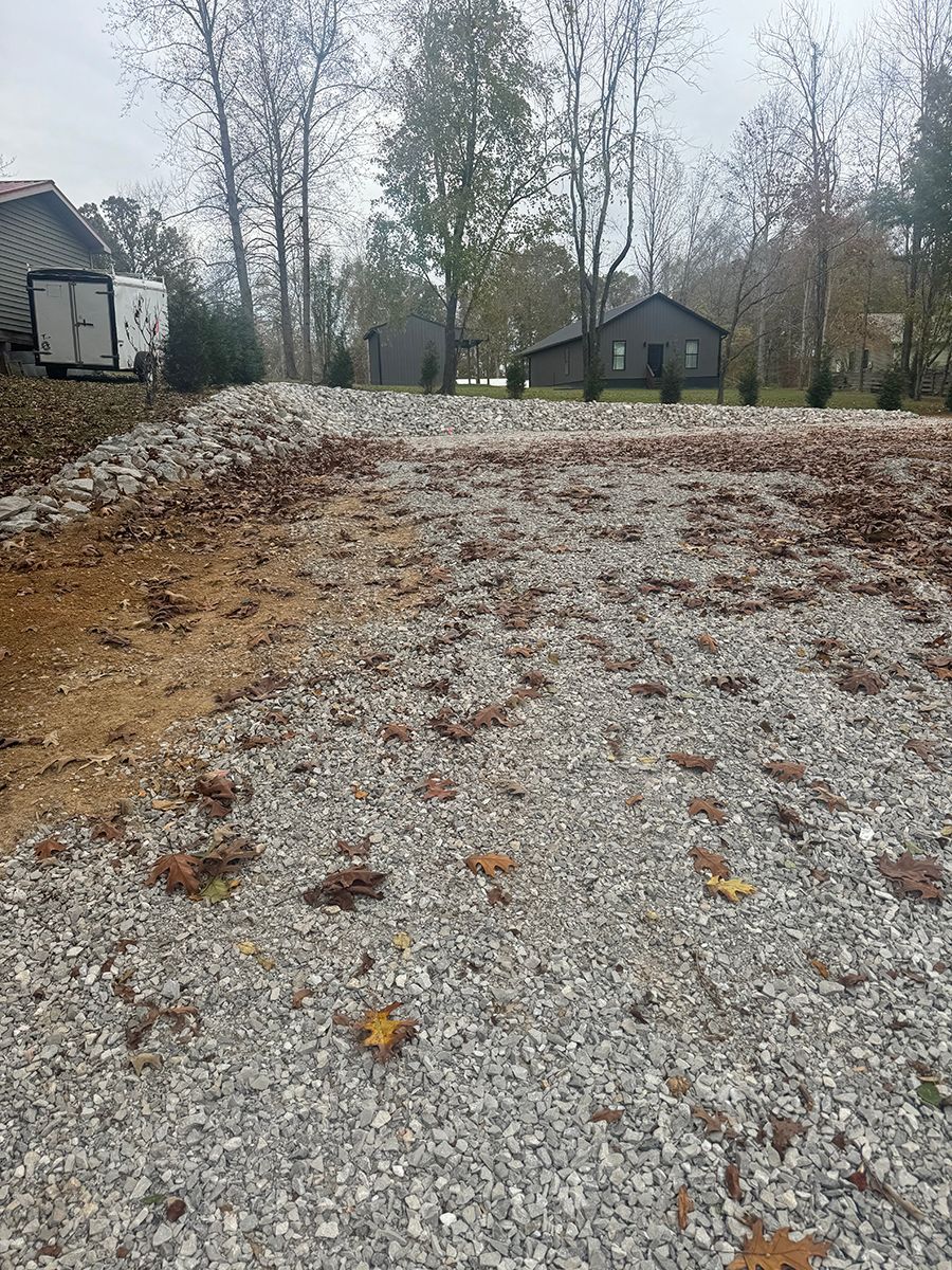 There is a lot of gravel in the middle of the road.