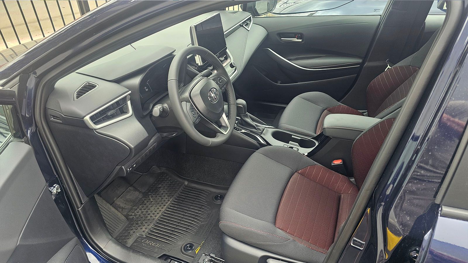 Interior of a car new car with driver's side door open