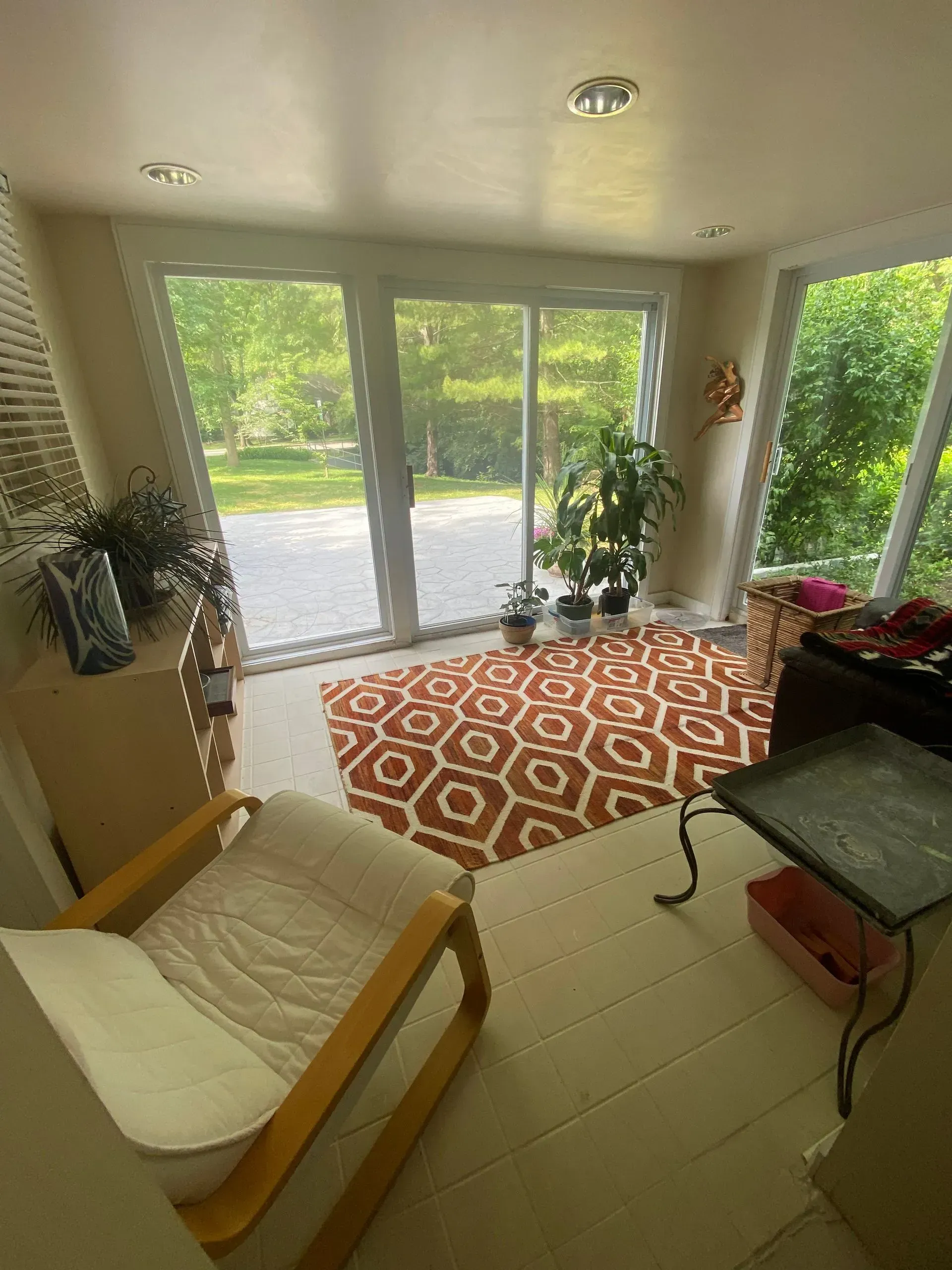 Wavy patterns of light and shadow on textured tan sand.